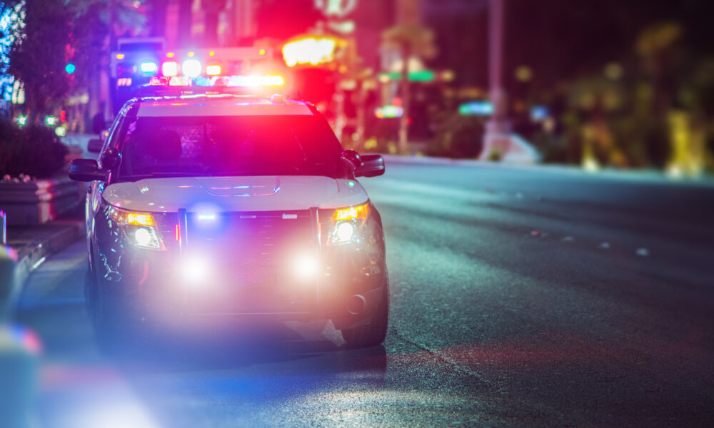 belleville Police Cruiser Emergency Assistance on the City Street. Police Car with Flashing Lights.