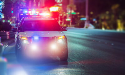 belleville Police Cruiser Emergency Assistance on the City Street. Police Car with Flashing Lights.